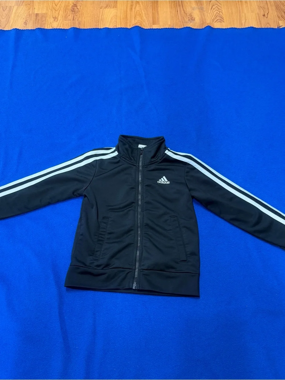 Adidas Black Jacket with White Sleeve Stripes kids 4 has flaws
